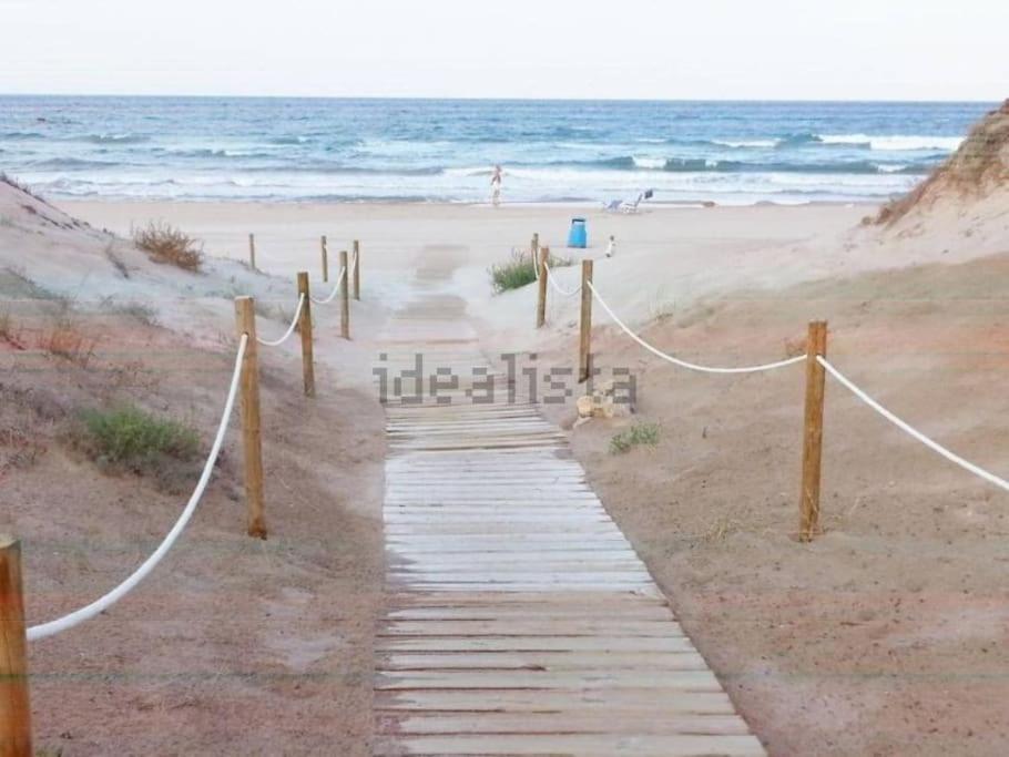 Holiday home Adosado En La Playa De El Perellonet Con Piscina, Pista Tenis