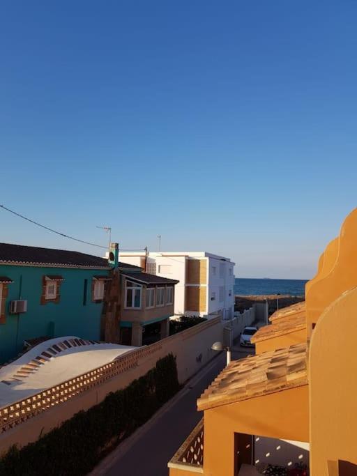 Holiday home Adosado En La Playa De El Perellonet Con Piscina, Pista Tenis