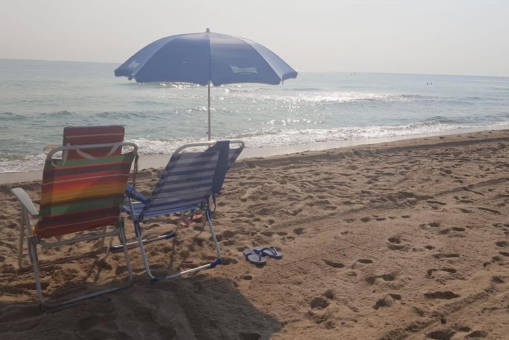 Adosado En La Playa De El Perellonet Con Piscina, Pista Tenis Holiday home